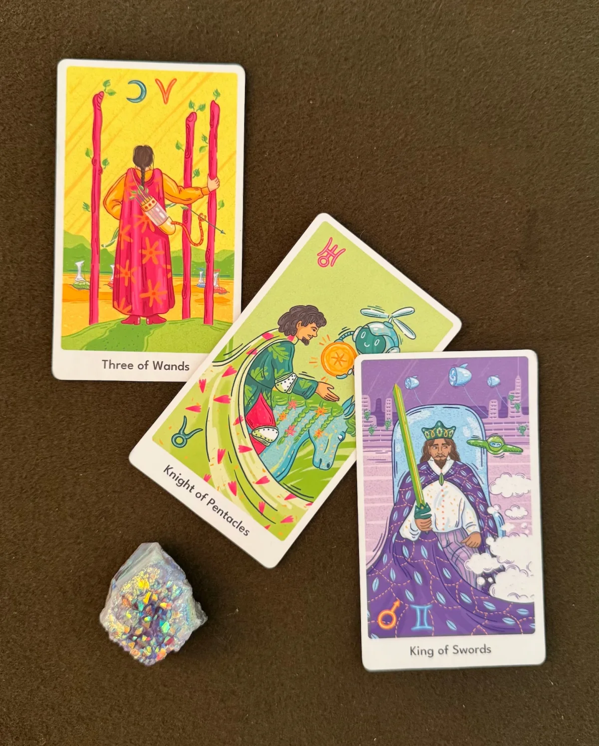Three Qybala cards arranged with a crystal for a 30-minute reading